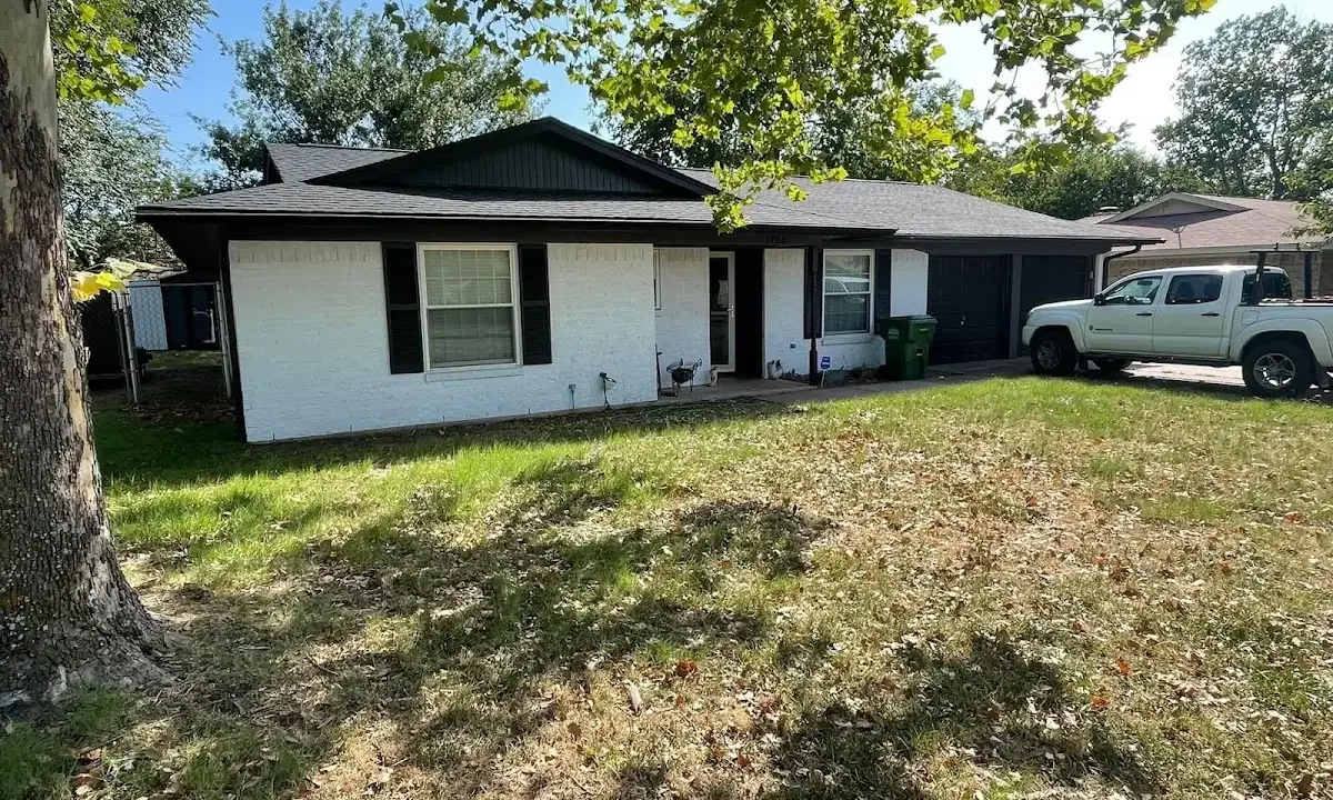 Professional roofing crew working on a residential roof in Ridgefield Park village